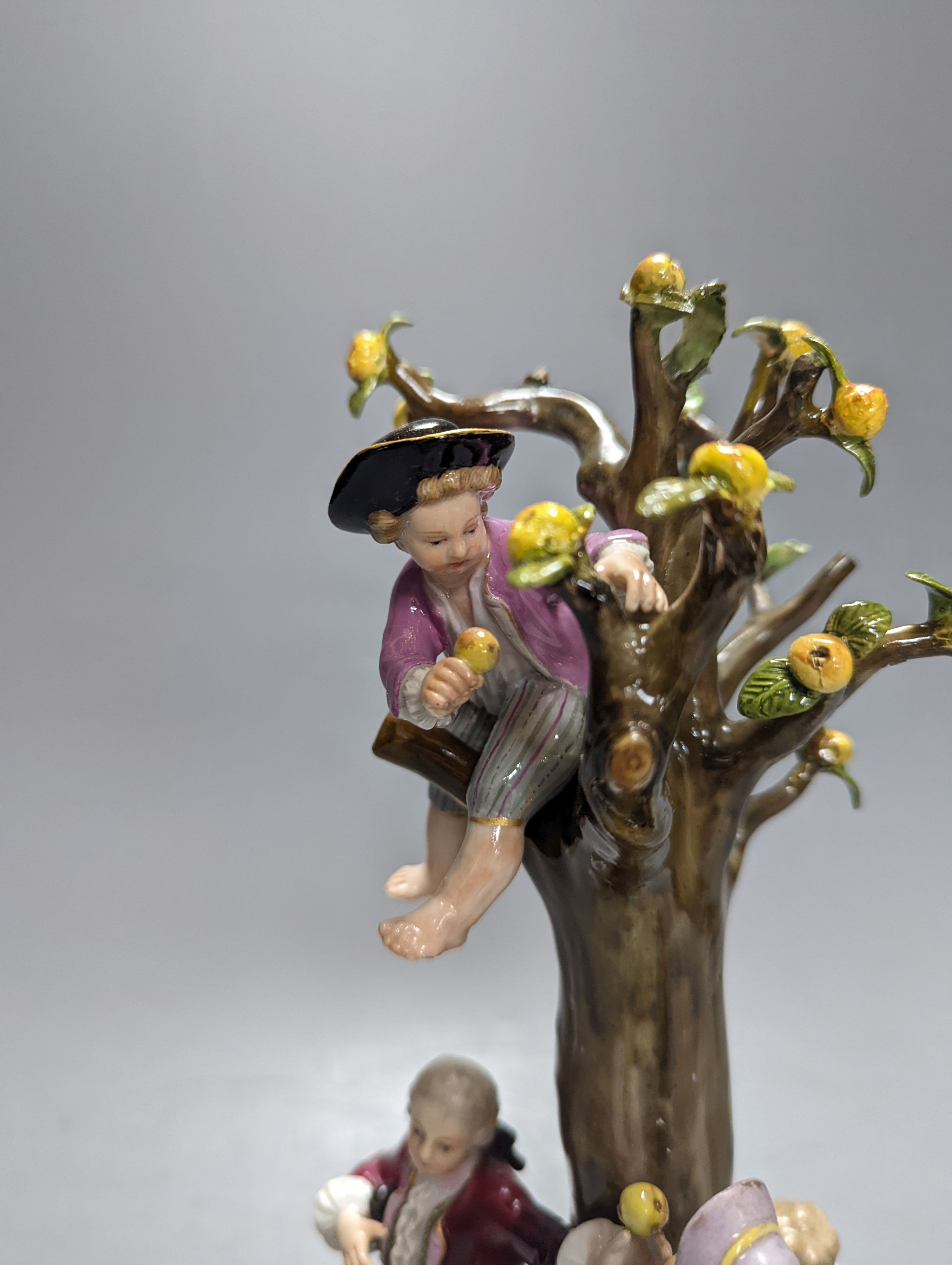 A 19th century Meissen porcelain figure group of fruit pickers, incised number to base ‘2229’. 26cm